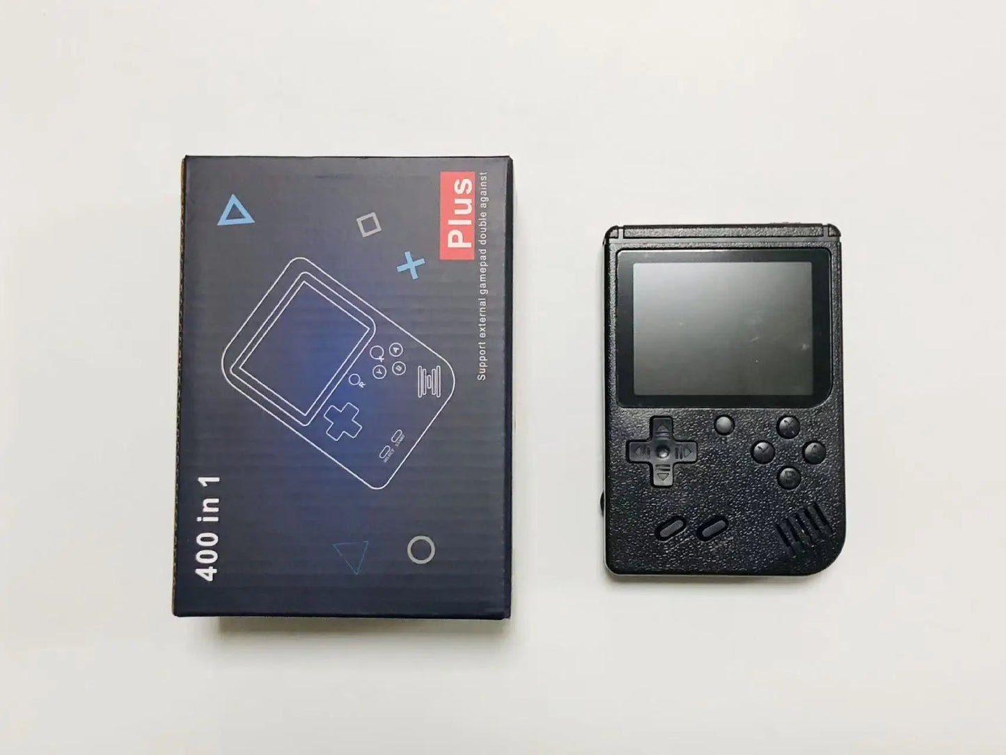 A Red Retro Classic Games Children's Handheld Small Game Console With 400 Game Charging Can Be Connected To The TV