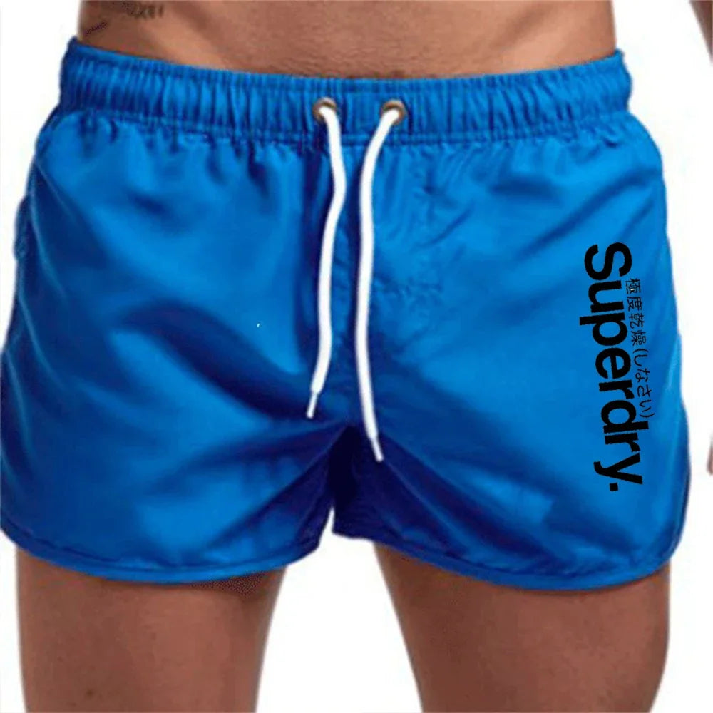 Summer Hot Selling Men's Beach Shorts Breathable Fast Drying Casual Fashionable Surfing Shorts 2024 Fitness Running Shorts